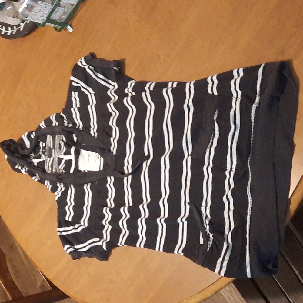 A black and white straps shirt with hood